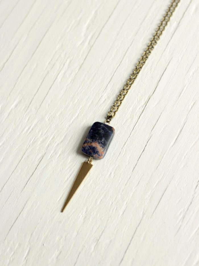 brass triangle necklace with matte sandstone bead