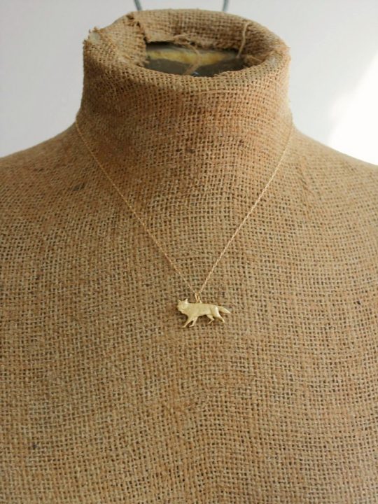 brass wolf necklace on a 14kt gold filled chain