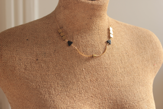 Brass bar necklace measures 16 inches and fits close to your collar