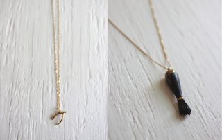 Good luck necklaces featuring the wishbone and figa necklaces.