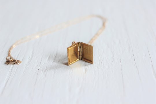 Book locket necklace on gold chain