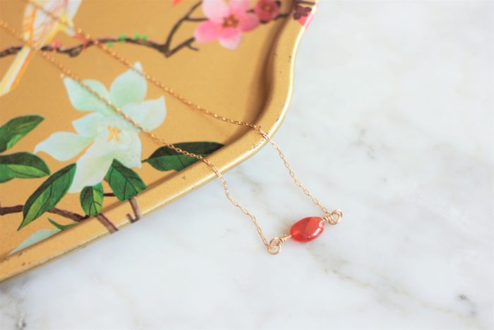 Real carnelian necklace on a gold chain