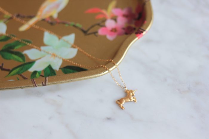 Unicorn necklace on a gold chain