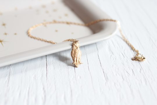 Owl pendant necklace on a gold chain