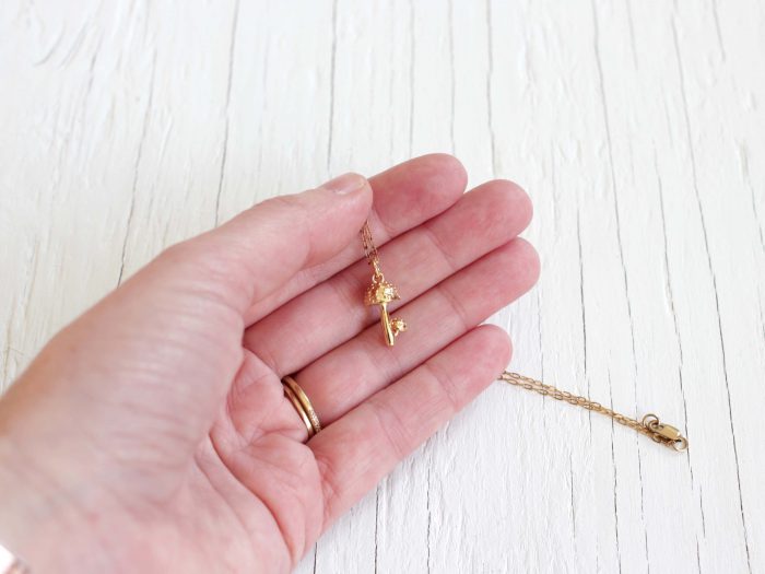 Tiny gold mushroom necklace